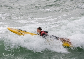 Surfers make most of stormy seas